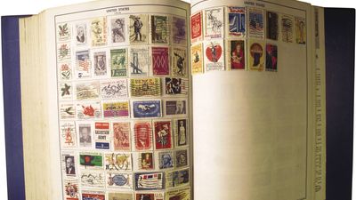 Vintage stamp-collecting book.