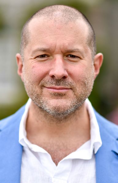 Jony Ive wearing a white shirt and blue blazer, photographed outdoors in 2015 when he was Apple's chief design officer