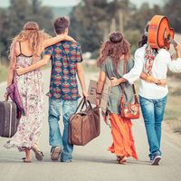 Hippie Group Walking on a Countryside Road