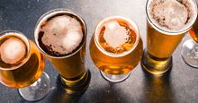 Beer glasses on dark table