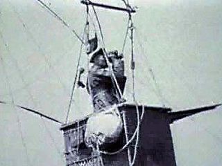Surveil the surroundings from a military balloon aircraft utilized throughout World War I