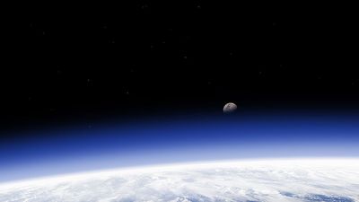 Earth's horizon and moon from space. (earth, atmosphere, ozone)