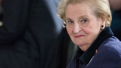 Close up photo of Madeleine Albright, a white woman with short blonde hair.
