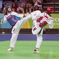 Mayu Hamada from Japan (blue) and Fenfen Chao from China (red). Mayu Hamada received the gold medal in the women's category -57Kg. Rio 2016 Olympic Park holds a test event for Rio 2016 Olympic Games.